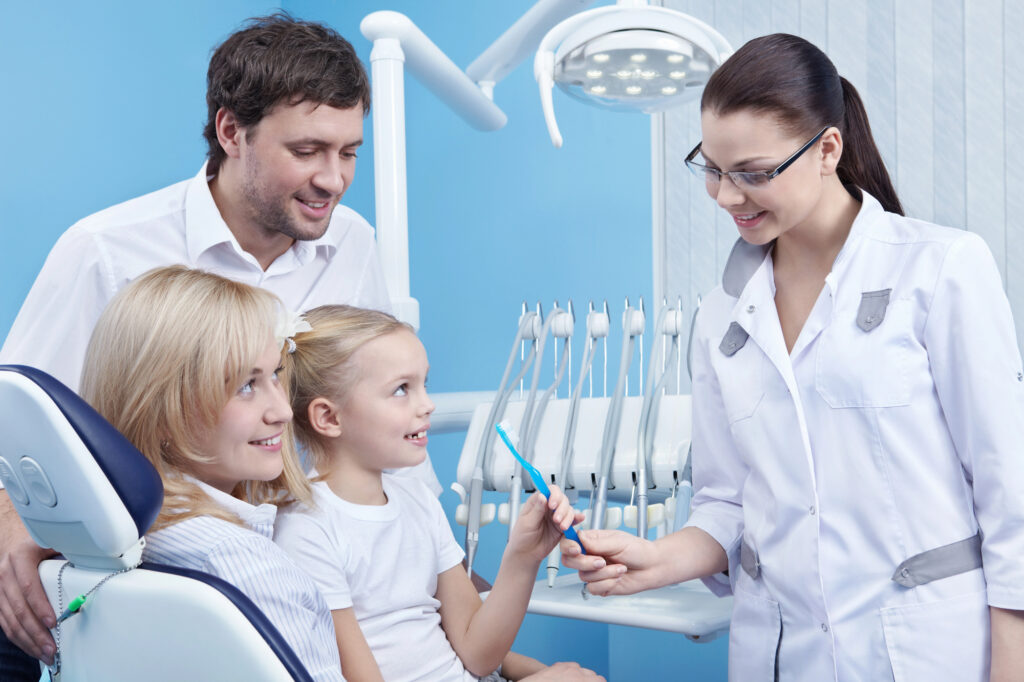 Family talking to their trusted dentist in west boca