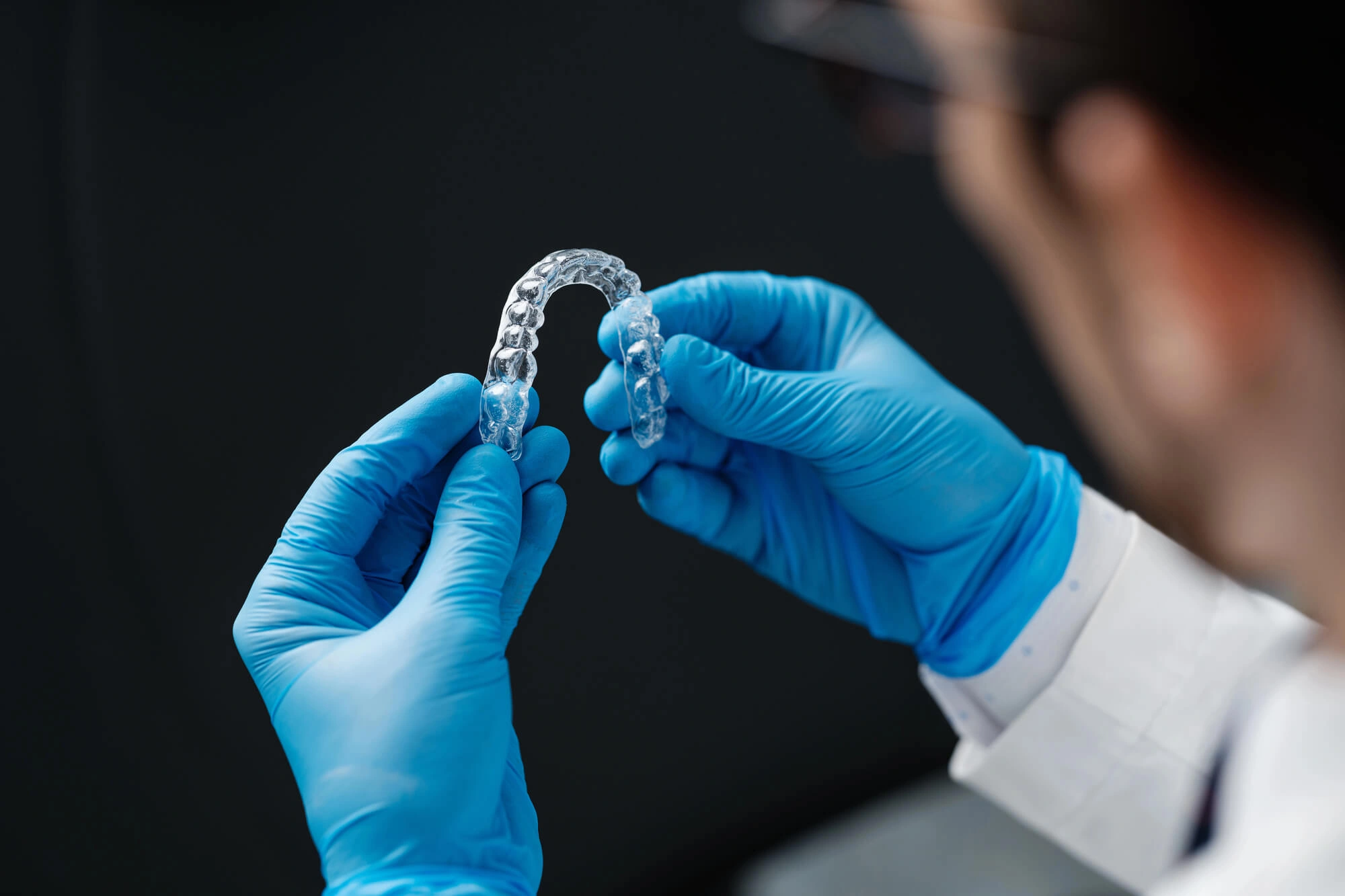 orthodontist boca raton holding invisalign