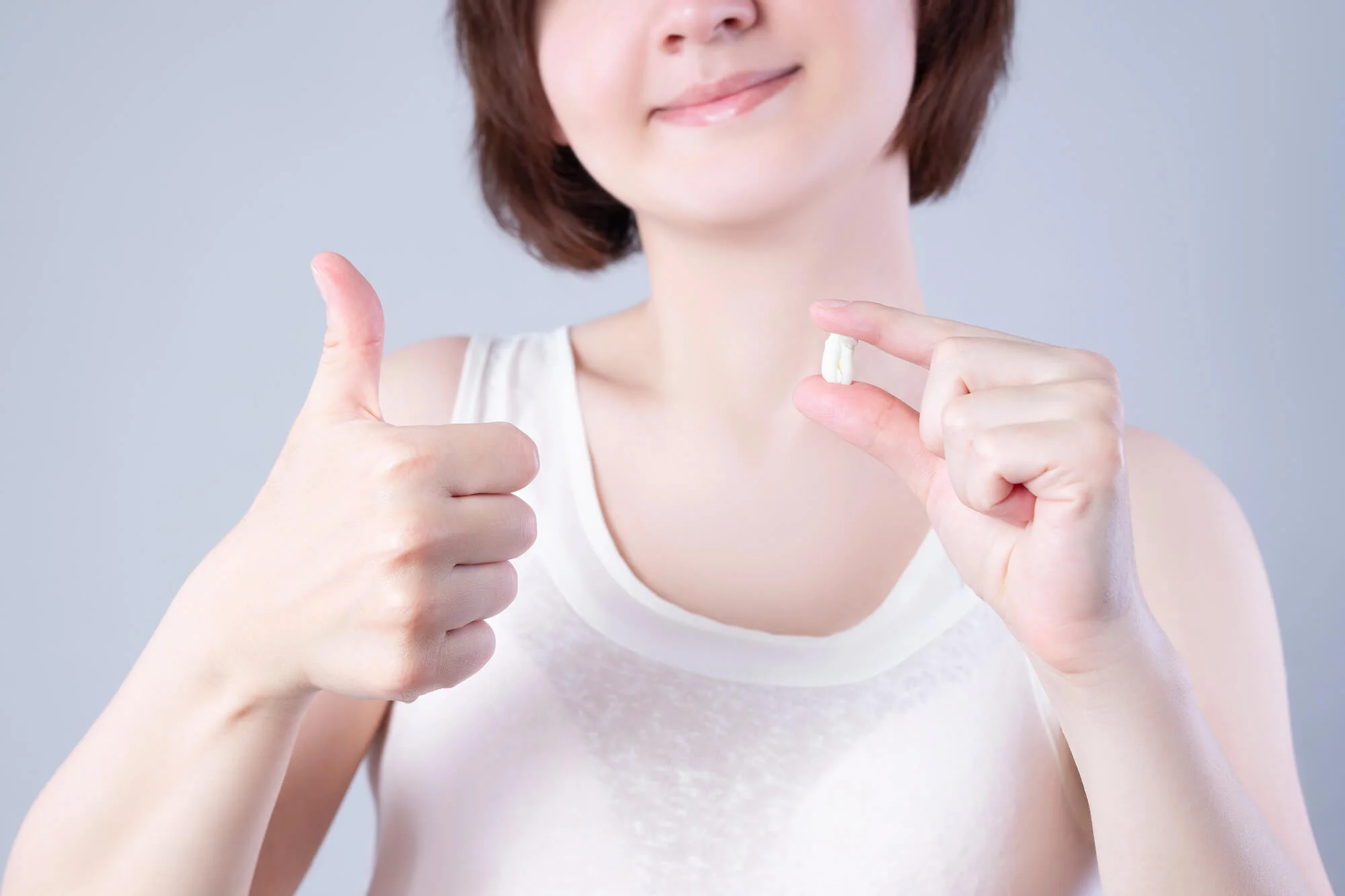 Woman smiling after wisdom teeth removal boca raton